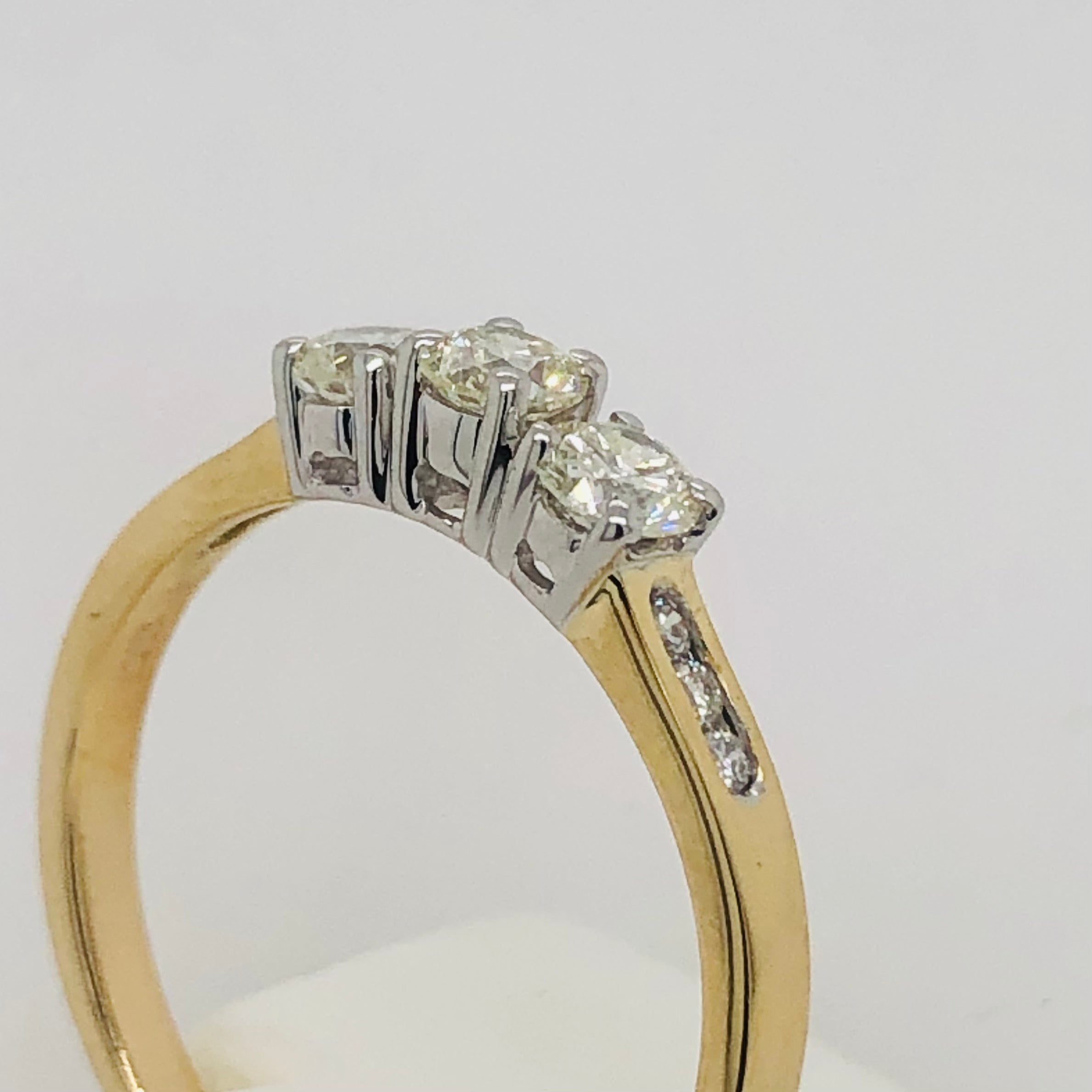 Three Stone Engagement Ring with 0.60 Carat TW of Diamonds in 9ct Yellow & White Gold Gold Rings Three Stone Engagement Ring with 0.60 Carat TW of Diamonds in 9ct Yellow & White Gold Gold Rings