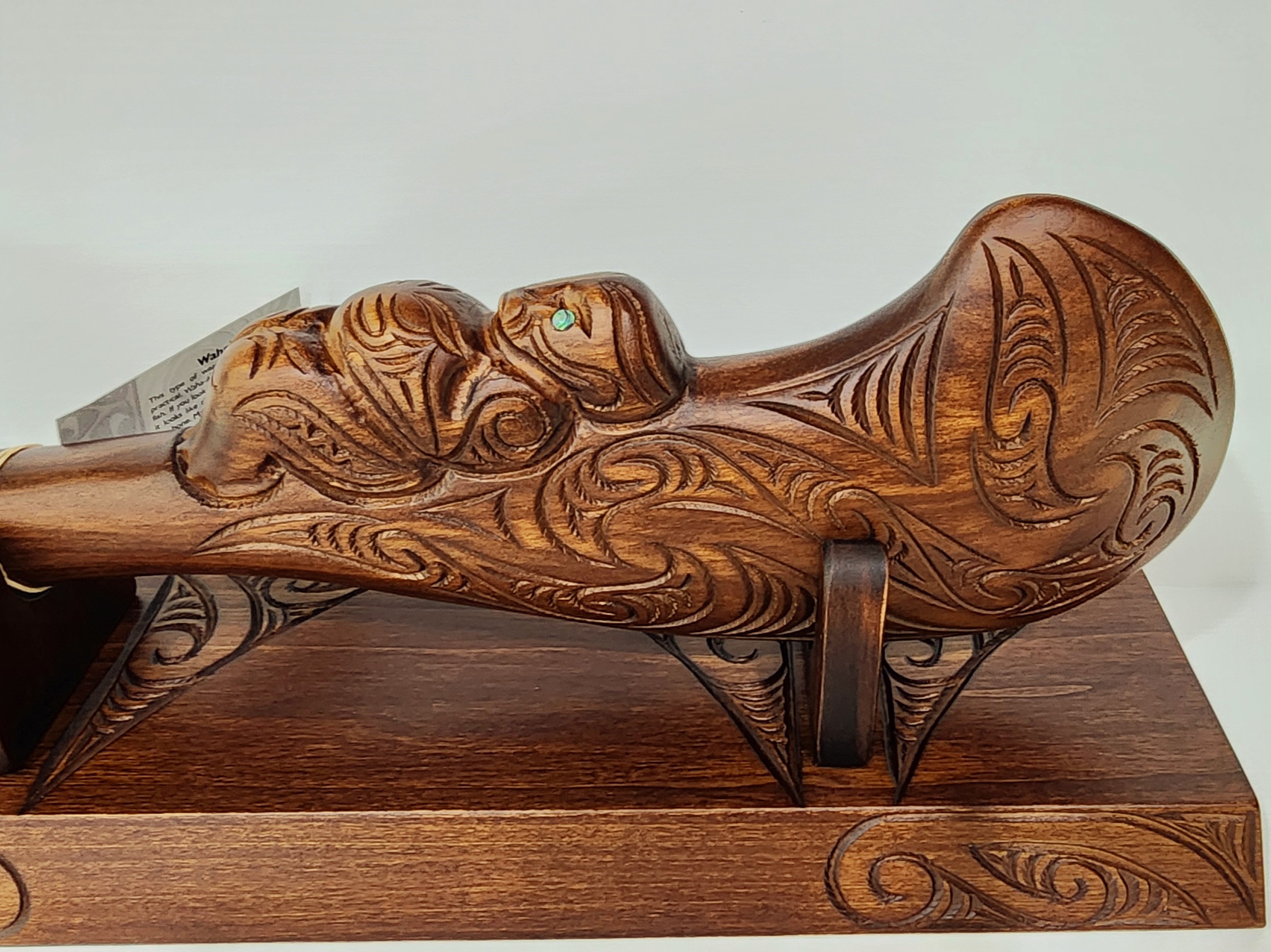 Large Carved Maori Wahaika Club with 21 Paua Inlaid on Stand 21st Keys Large Carved Maori Wahaika Club with 21 Paua Inlaid on Stand 21st Keys