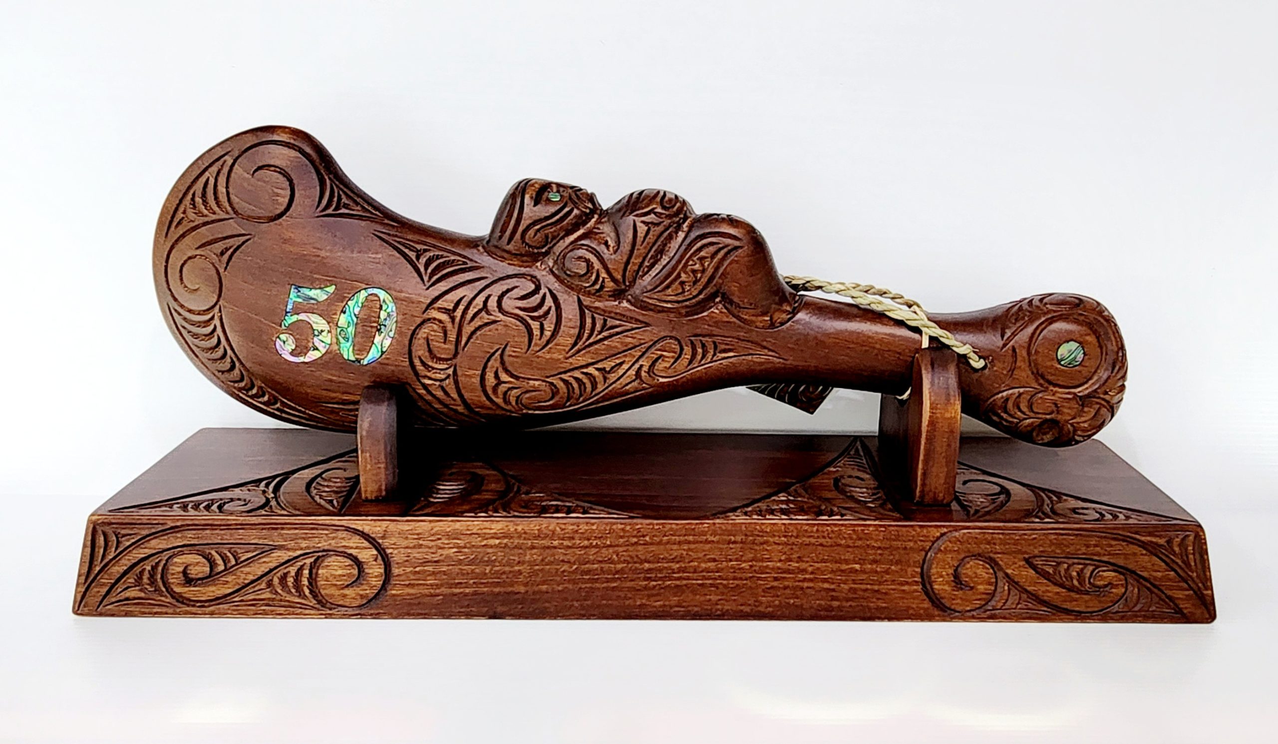 Large Carved Maori Wahaika Club with 50 Paua Inlaid on Stand 21st Keys 
