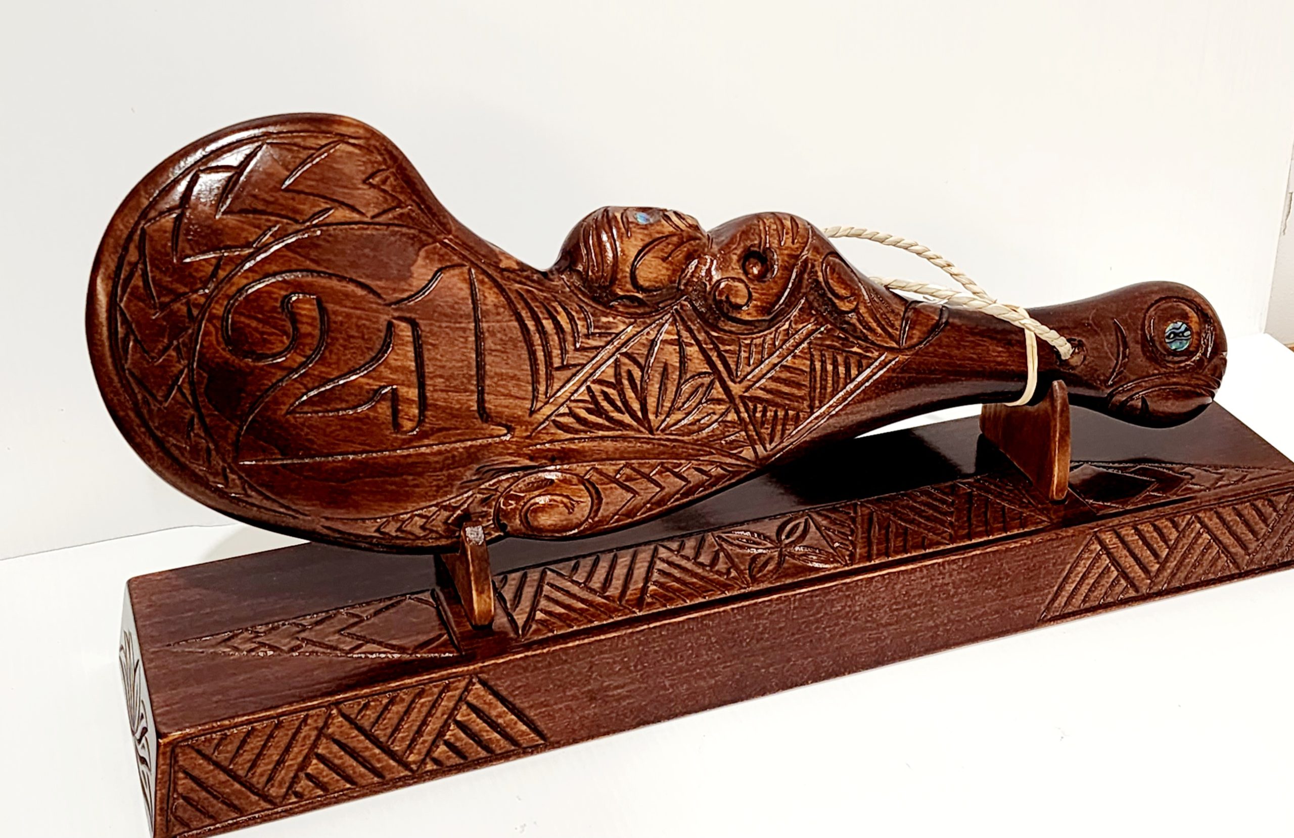 Hand Carved 21st Wahaika on Base with Island Patterns with Paua Shell Eyes 21st Keys Hand Carved 21st Wahaika on Base with Island Patterns with Paua Shell Eyes 21st Keys