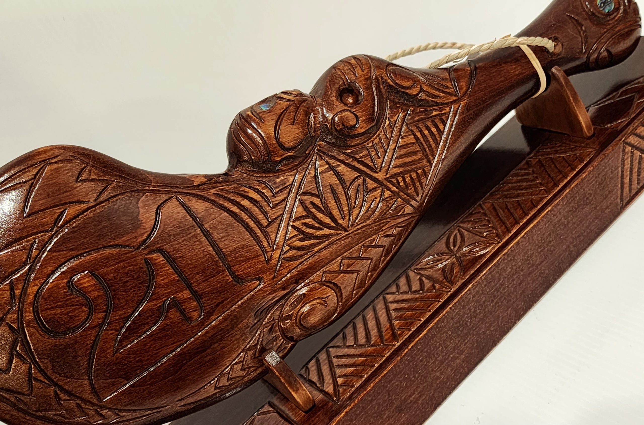 Hand Carved 21st Wahaika on Base with Island Patterns with Paua Shell Eyes 21st Keys Hand Carved 21st Wahaika on Base with Island Patterns with Paua Shell Eyes 21st Keys