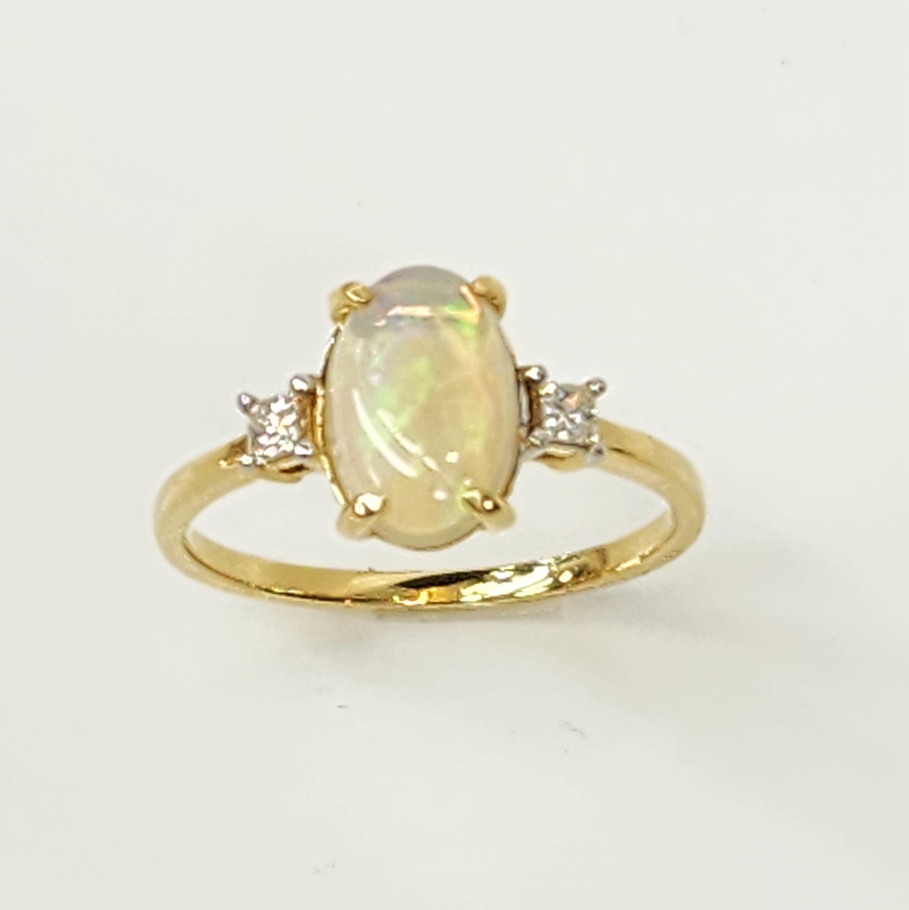18ct Yellow Gold Oval Opal Ring with Diamond Accents Gold Rings 18ct Yellow Gold Oval Opal Ring with Diamond Accents Gold Rings