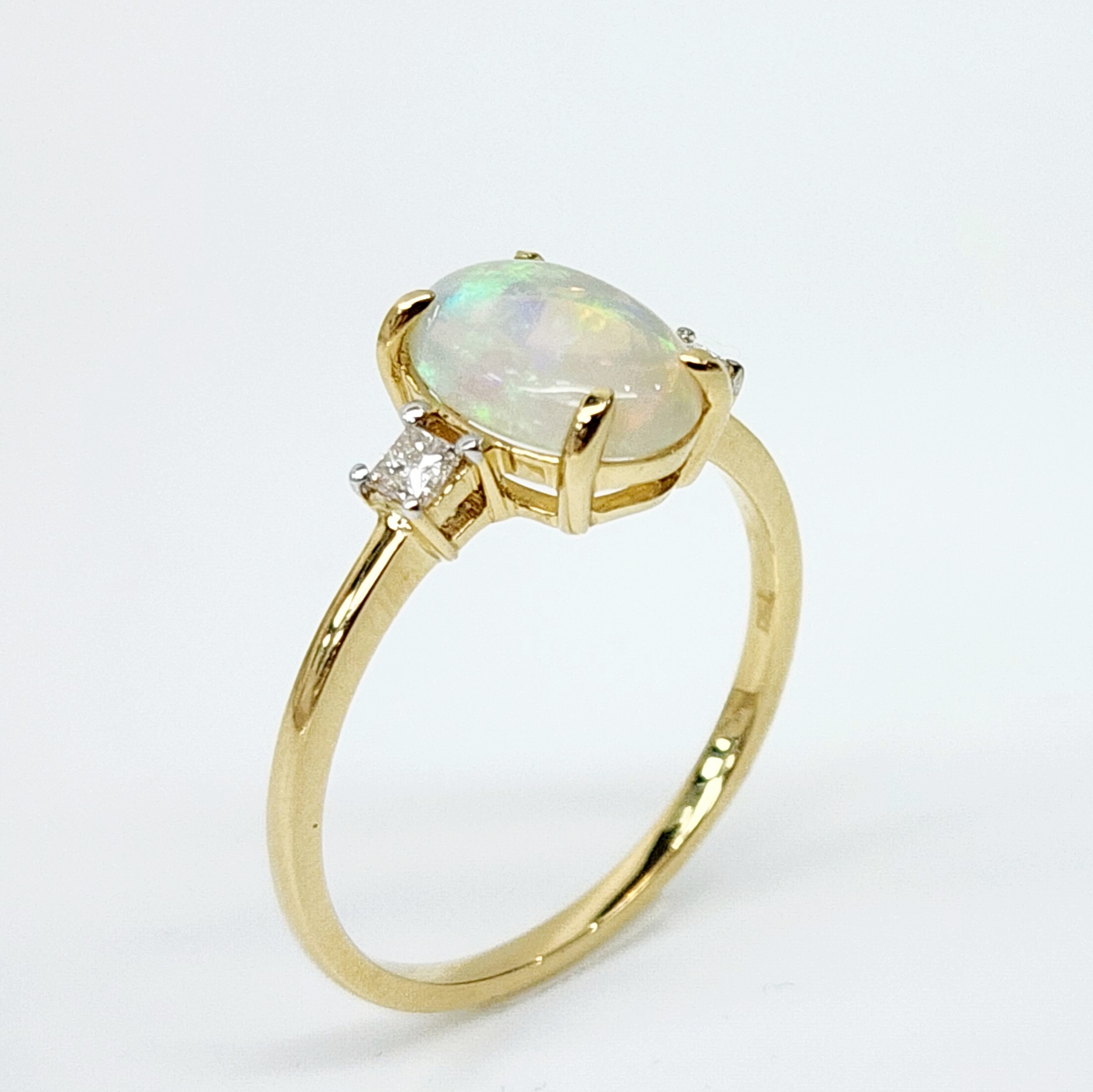 18ct Yellow Gold Oval Opal Ring with Diamond Accents Gold Rings 18ct Yellow Gold Oval Opal Ring with Diamond Accents Gold Rings