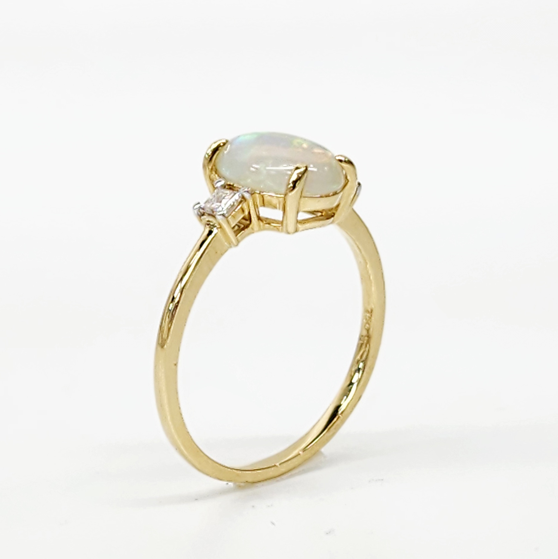 18ct Yellow Gold Oval Opal Ring with Diamond Accents Gold Rings 18ct Yellow Gold Oval Opal Ring with Diamond Accents Gold Rings