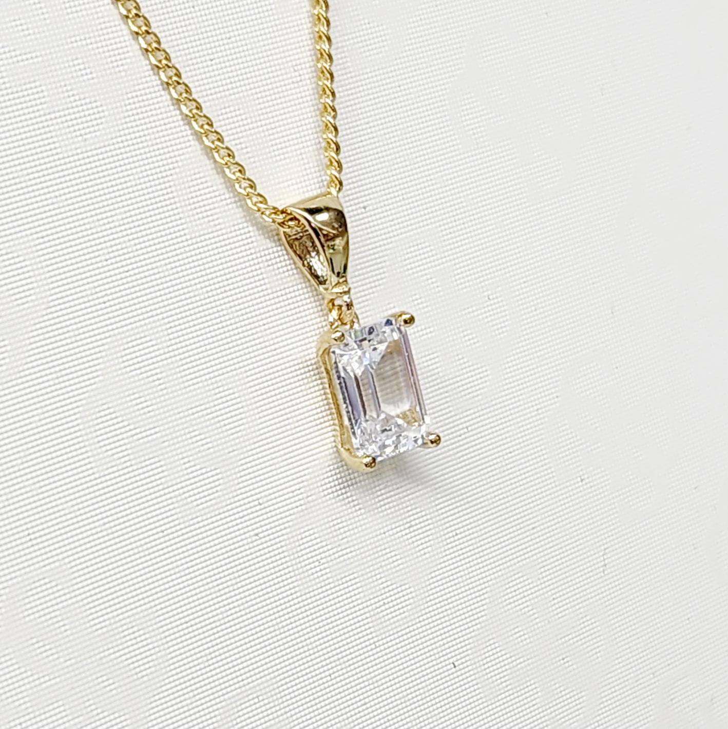 9ct Yellow Gold 5mm x 7.7mm Emerald Cut CZ 4 Claw Pendant Gold Bracelets 