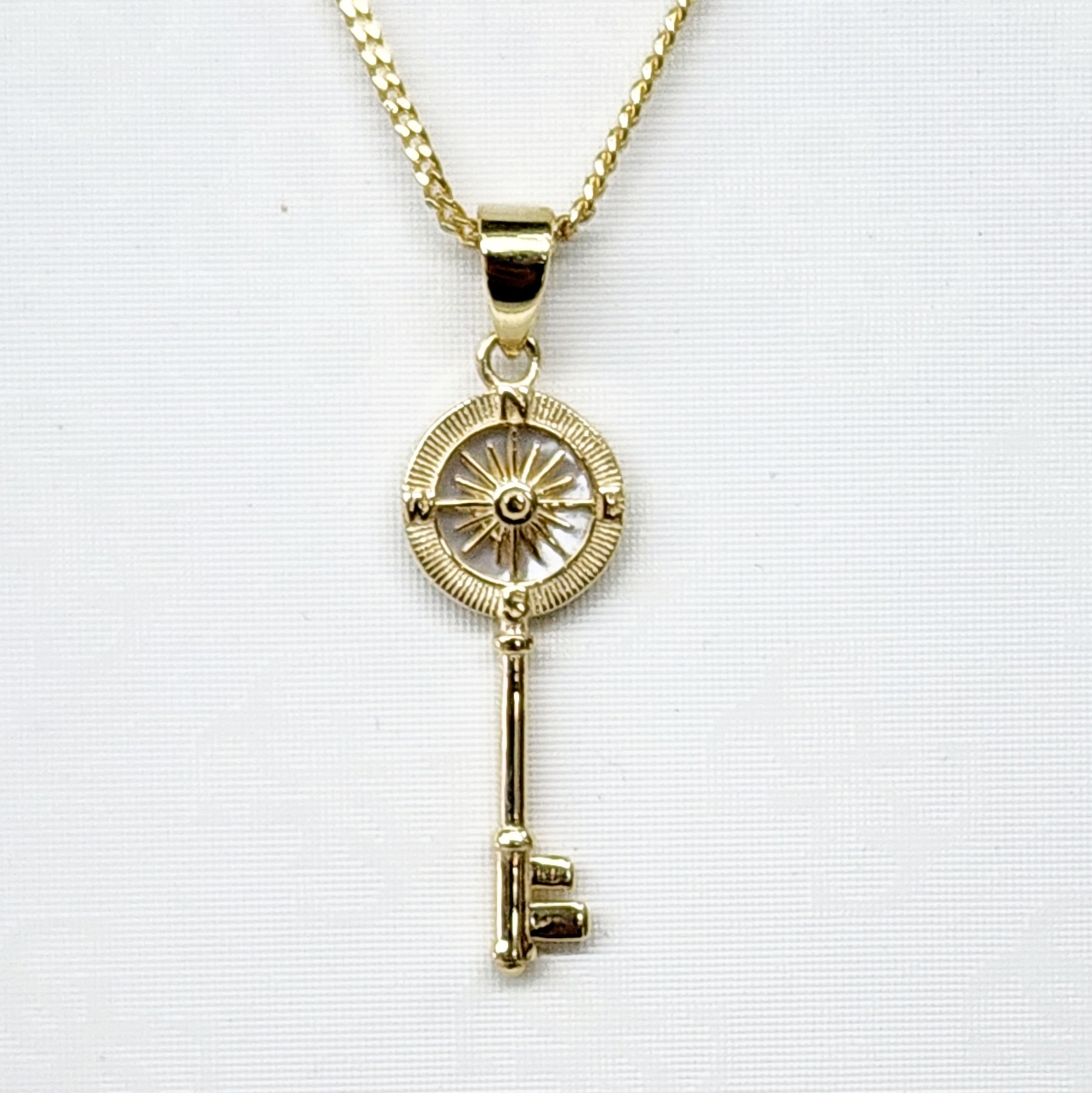 9ct Yellow Gold Mother of Pearl Compass Key Pendant Gold Bracelets 9ct Yellow Gold Mother of Pearl Compass Key Pendant Gold Bracelets