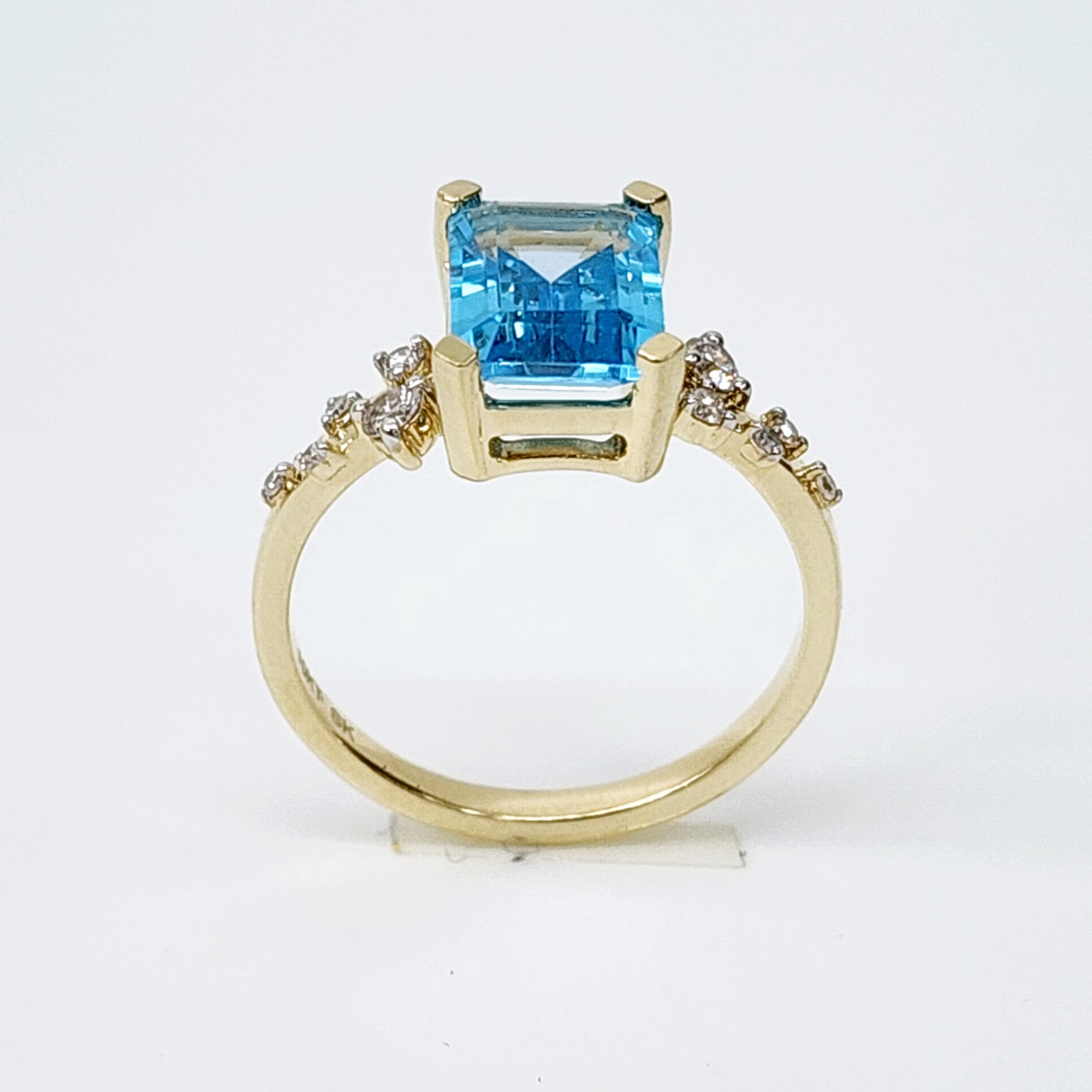 10ct Yellow Gold 0.15ct Diamond & 2.40ct Emerald Cut Blue Topaz Ring - SKR41115BT Gold Rings 10ct Yellow Gold 0.15ct Diamond & 2.40ct Emerald Cut Blue Topaz Ring - SKR41115BT Gold Rings