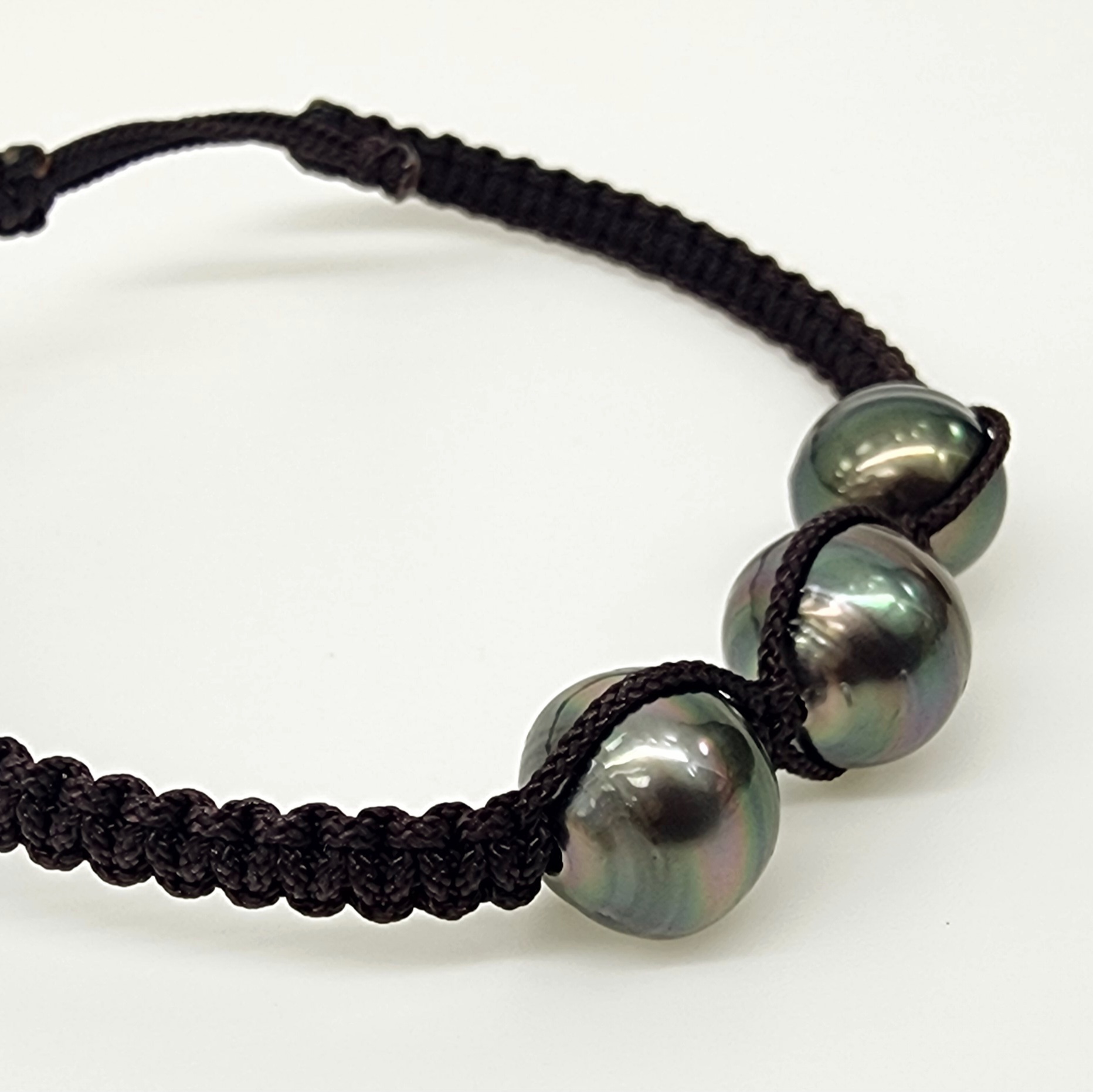 11mm Round Triple Tahitian Black Pearl, Unisex Brown Cord Adjustable Size Bracelet - 22072812BRN-3P Pearl Jewellery, Sterling Silver Pearl Jewellery 11mm Round Triple Tahitian Black Pearl, Unisex Brown Cord Adjustable Size Bracelet - 22072812BRN-3P Pearl Jewellery, Sterling Silver Pearl Jewellery