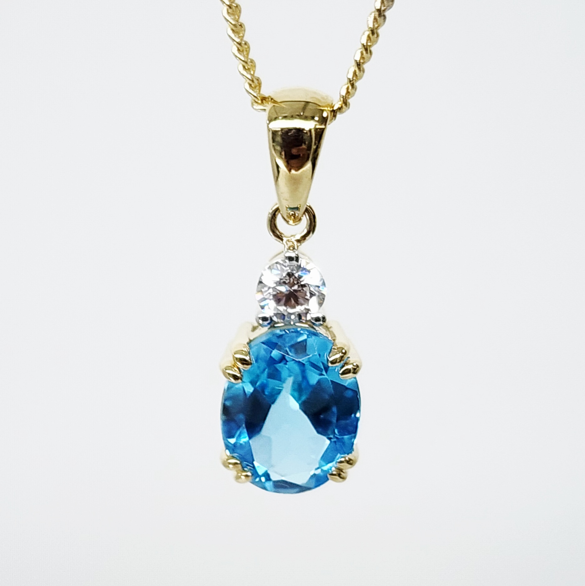 9ct Yellow Gold Oval Cut Blue Topaz and 0.17ct Round Cut Lab Grown Diamond Pendant - D/A470PD-TPZLG  