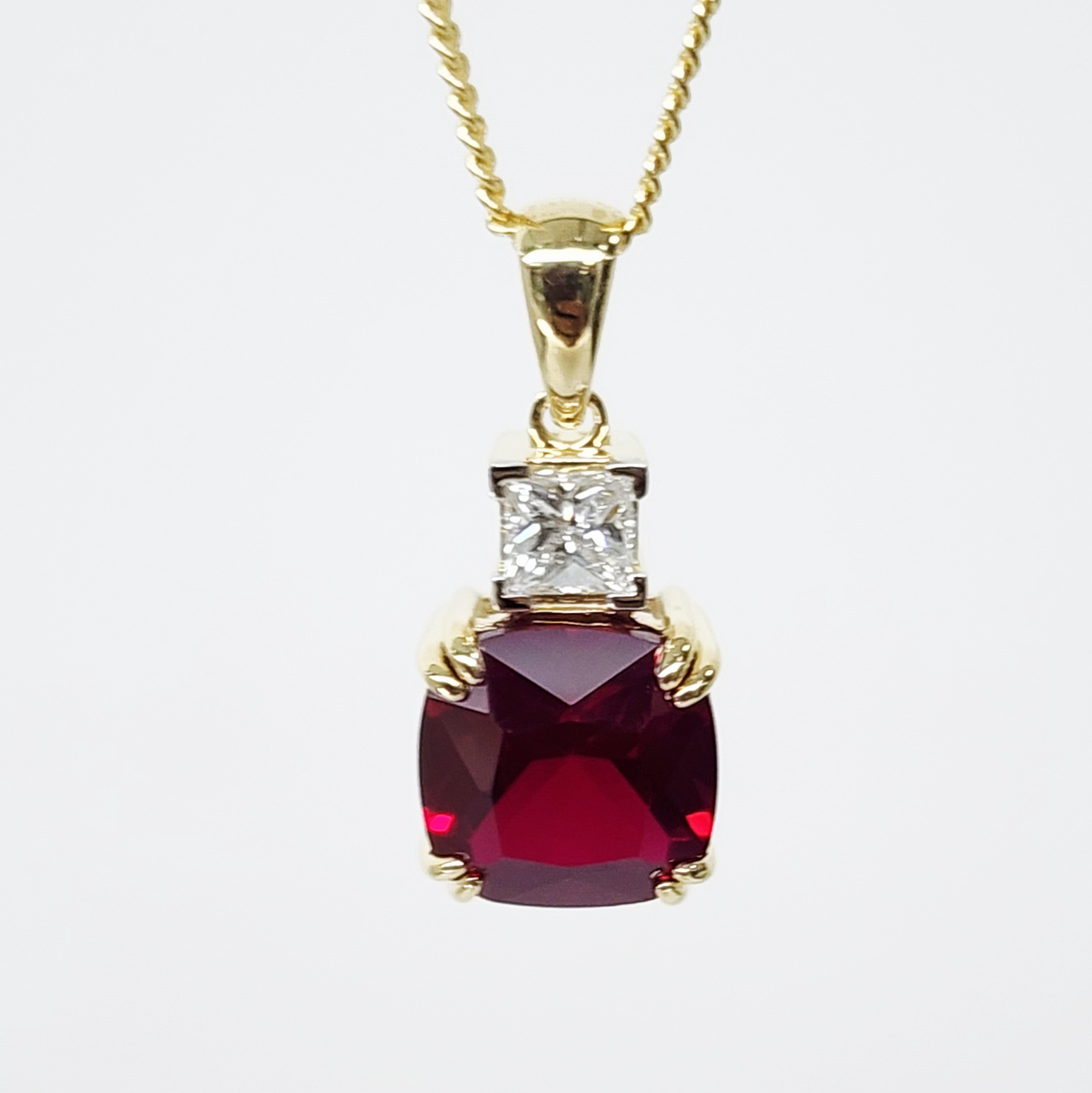 9ct Yellow Gold Cushion Cut Created Ruby and 0.32ct Princess Cut Lab Grown Diamond Pendant - D/A472PD-CRLGD  