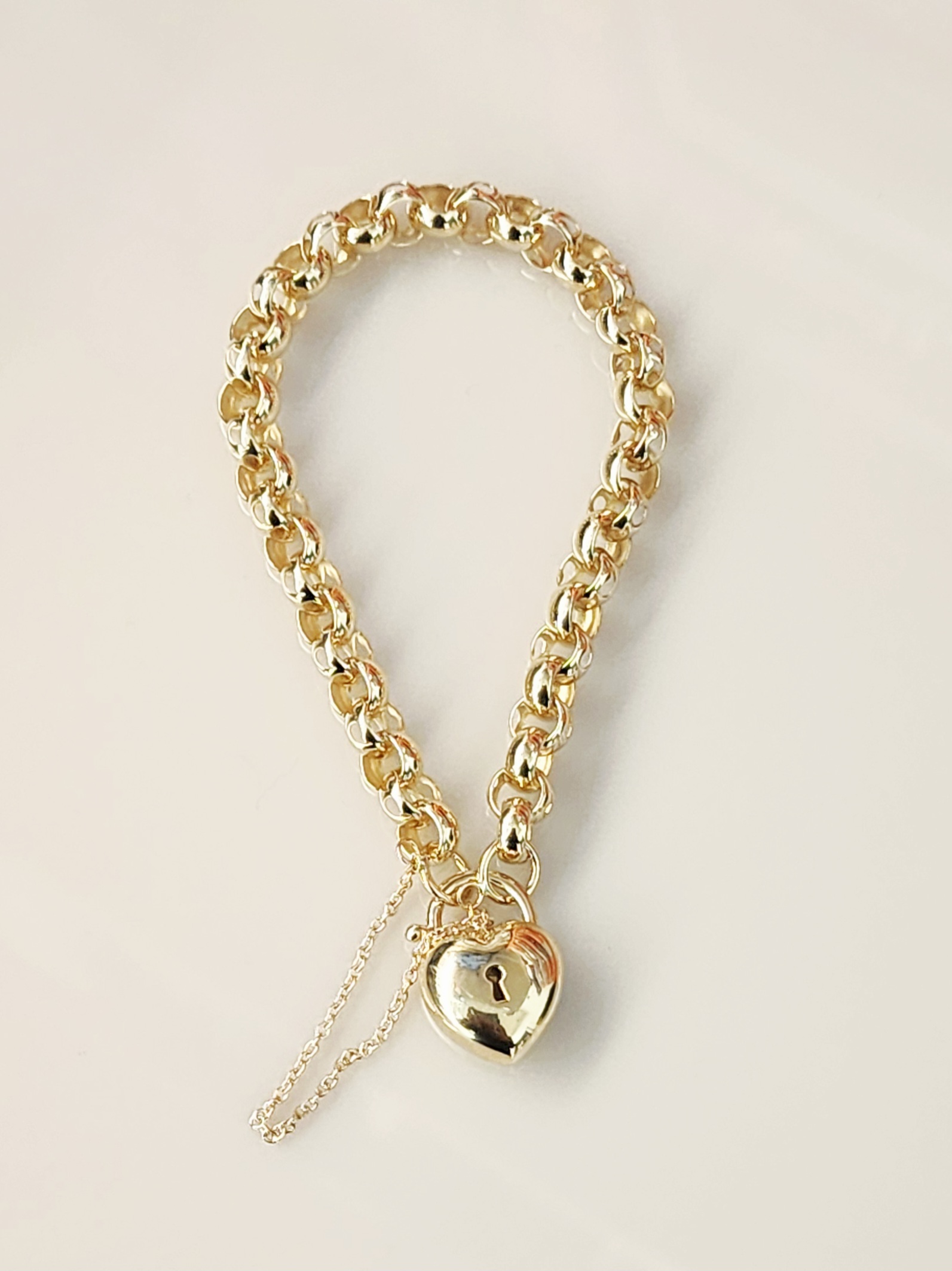 9ct Yellow Gold Puff Heart Padlock Bracelet – 14.30g, 19cm Belcher Link with Safety Chain - 9CTCYBA56 9ct Yellow Gold Puff Heart Padlock Bracelet – 14.30g, 19cm Belcher Link with Safety Chain - 9CTCYBA56