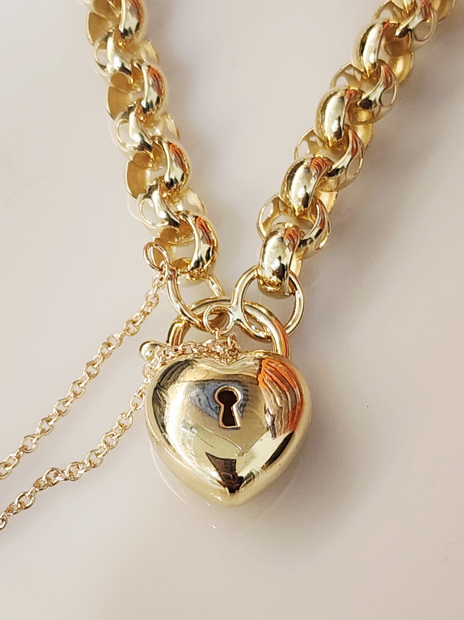 9ct Yellow Gold Puff Heart Padlock Bracelet – 14.30g, 19cm Belcher Link with Safety Chain - 9CTCYBA56 9ct Yellow Gold Puff Heart Padlock Bracelet – 14.30g, 19cm Belcher Link with Safety Chain - 9CTCYBA56